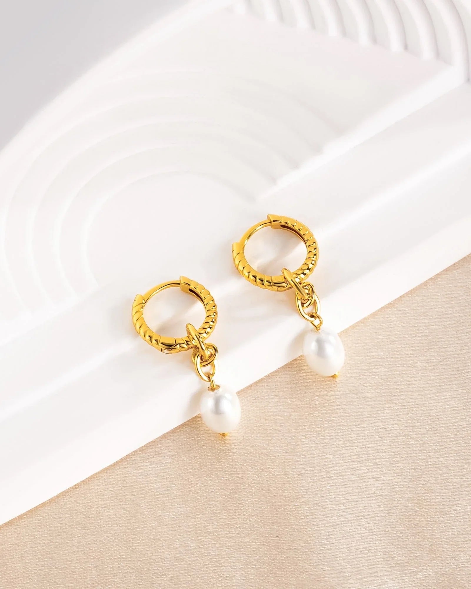 earrings with pearl drops