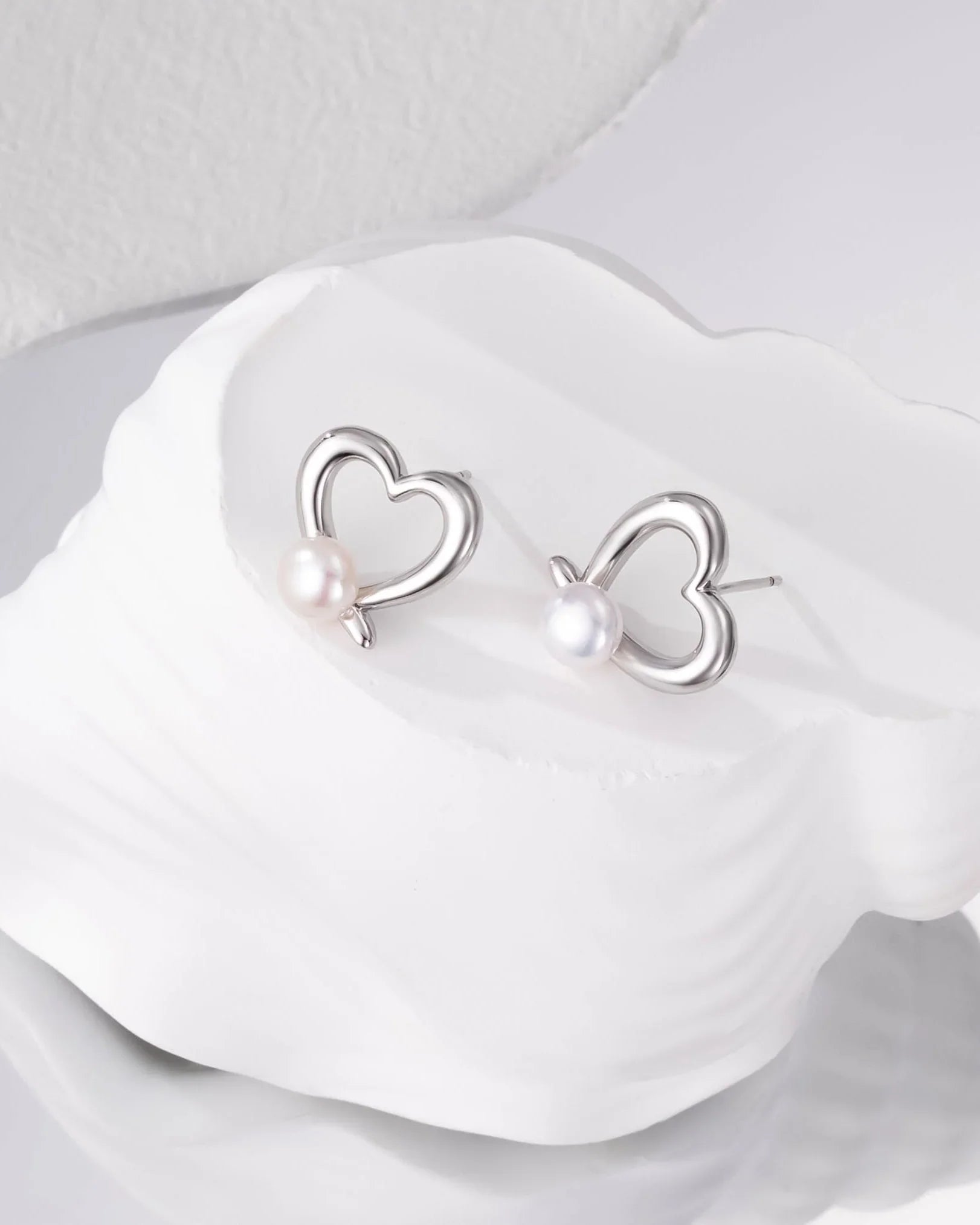 heart-shaped pearl earrings
