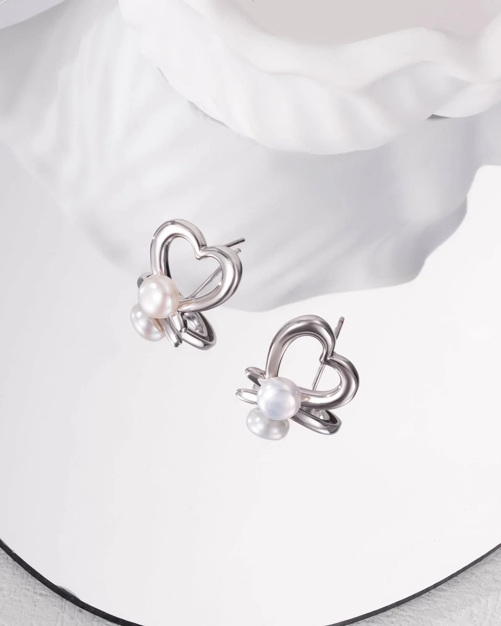 heart-shaped pearl earrings